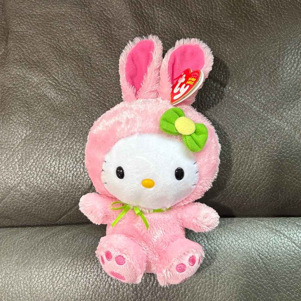 Hello kitty plush rabbit with green bow